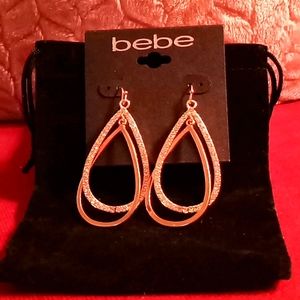 BeBe Gold Dangling Hoop Earrings with Crystals